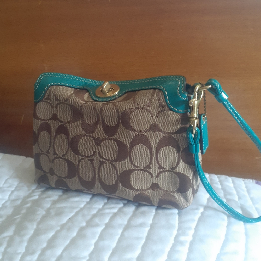 Coach signature turnlock canvas and teal leather wristlet